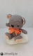 Sito ours doudou amigurumi crochet marron et orange 