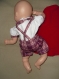 Vêtement de poupée (24 à 30cm):  bermuda, corsage, cape rouge