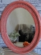 Miroir ovale patiné rose orangé lin