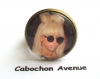 B4.14 bijou lady gaga porte-clés bijou fantaisie bronze cabochon verre célébrité chanteuse music musique lunettes étoile star (série 5)
