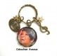 B4.123 bijou rihanna collier pendentif bijou fantaisie bronze cabochon verre célébrité chanteuse music guitare notes de musique étoile star (série 3)