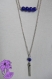 Double je - collier double rang, barre avec perles et pompon - coloris doré ou argenté - bleu ou hématite ou bordeaux ou gris