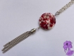 Jap - collier sautoir chaîne argentée, perle plate mouchetée rouge et pompon argenté