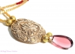 Collier créateur aux motifs raffinés, antique,baroque, création artisanale  en pâte de bronze doré