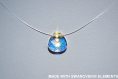Swarovski  collier avec pendentif poire crystal ab sur fil nylon