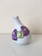 Vase en porcelaine décoré à main levée