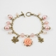 Bracelet breloques cabochon fleur rose en métal bronze 