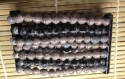 Manchette en perles de papier taupe et noir, circonférence 20cm, hauteur 5.5cm