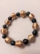  bracelet 1 tour en perles de papier recyclé vieil or et noir, longueur environ 20cm.  modèle unique, fabriqué à la main.