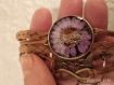 Bracelet with a cabochon made of dried flower in resin. natural flower in resin.