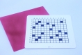 Carte postale « crosswords » personnalisable avec une grille de mots croisés vierge