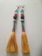 Boucles d'oreilles pendantes ethnique bohème avec pompons aux couleurs chaleureuses