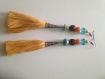 Boucles d'oreilles pendantes ethnique bohème avec pompons aux couleurs chaleureuses