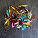 Lot de 70 perles dagues synthétiques multicolores - 20 x 5 mm