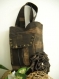 Women's bag made of dense textile in brown,