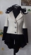 Elegant black and white coat made of woolen fabric