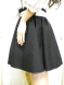 Elegant ladies' black skirt with white stitching and elastic waistband.