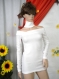 Elegant white tunic with bare shoulders made of fleece.