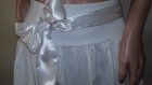 Elegant white ladies' skirt in pieces with a set and a ribbon of cotton with elastane