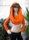 Non-standard orange bolero with shawl hood .