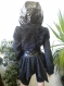 Unusual ladies coat made of woolen textiles, eco fluff lacquer watts.