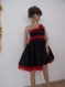 Elegant red dress with red flowers, red organza, one shoulder made of black satin with elastane and red organza