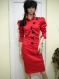 Stylish and elegant red suit with black buttons