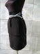 Black straight skirt with black white trim and satin finish
