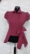Stylish pink jacket with short sleeve sleeves made of 100% cotton.