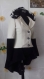 Elegant black and white coat made of woolen fabric