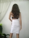 Elegant white skirt with ribbon, the model is made of cotton with elastan