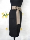 Elegant black straight skirt with belt.