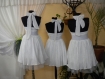 White ladies dress with bare back of fine white wrinkled cotton dress with crinoline, lace waist