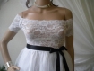 Elegant white dress, top lace with elastic, lower textile.