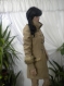Unique. beautifully and stylishly unconventional women's coat made of wool textiles.