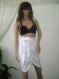 Elegant white skirt with ribbon, the model is made of cotton with elastan
