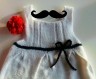 Tricot robe blanche avec petit noeud noir 12 mois