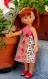 Fiche tricot-couture : robe dos nu pour poupées de 32-33 cm