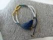 Bracelet d'amitié perles bleues et dorées avec pompon
