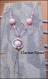 Unique collier pendentif chaîne en métal argenté et perles acryliques rose 34x110mm 66cm