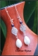 Boucles d'oreilles intercalaires en métal argenté et perles verre nacrés 9x66mm