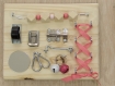 Busy board - montessori - tableau d'activités sensorielles