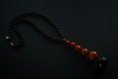 Collier de perles en bois / noir - orange (réf : 9027)