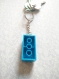 Porte-clés brique de lego bleu clair 