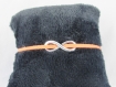 Bracelet " infini, suédine orange ", avec tour de poignet réglable - ref bs023 