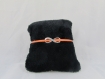 Bracelet " infini, suédine orange ", avec tour de poignet réglable - ref bs023 
