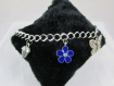 Bracelet "fleur bleue, papillon et cupcake" en métal argenté 