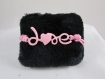 Bracelet en coton ciré rose "love", avec tour de poignet réglable 