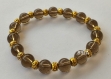 Bracelet bien-être en quartz fumé 8 mm perles rondes dorées argent du tibet 
