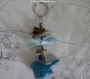 Porte - clés et/ou bijou de sac oiseau bleu et bois flotté 